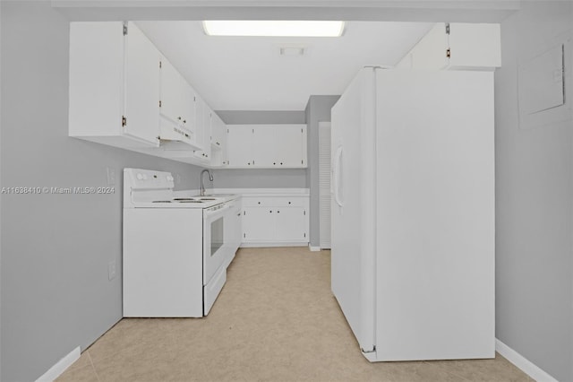 laundry area featuring light tile patterned flooring and sink