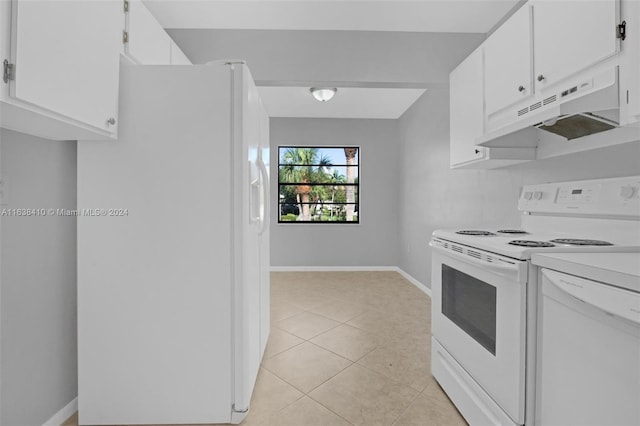 kitchen featuring light tile patterned flooring, white appliances, and white cabinetry