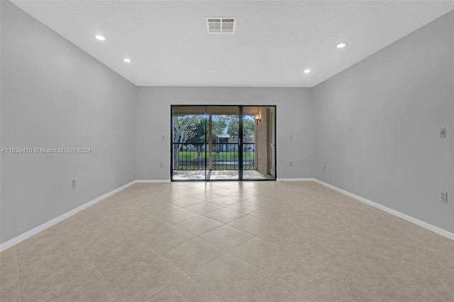 view of tiled spare room