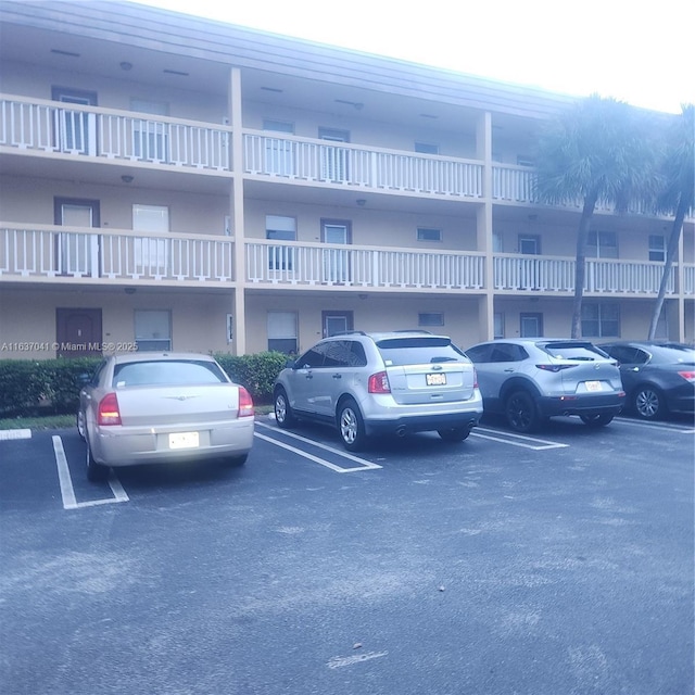 5800 NW 64th Ave Unit 108, Tamarac, FL 33319 - view of apartment building / complex with uncovered parking