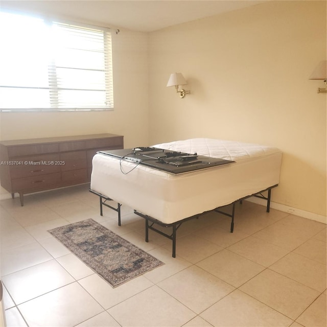 5800 NW 64th Ave Unit 108, Tamarac, FL 33319 - tiled bedroom with baseboards