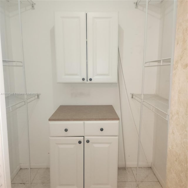 5800 NW 64th Ave Unit 108, Tamarac, FL 33319 - spacious closet with light tile patterned floors