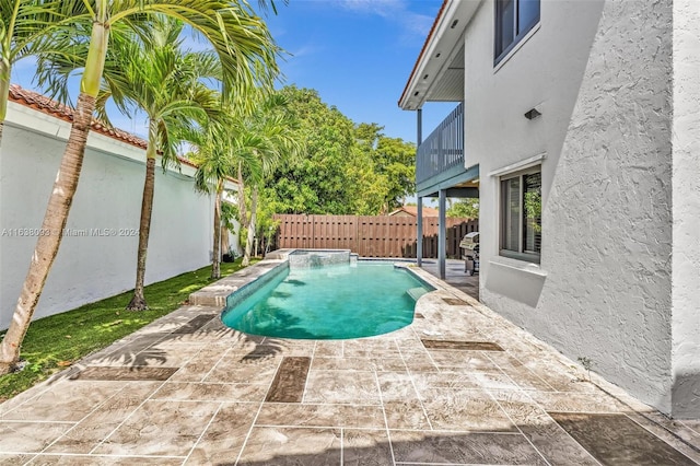 view of pool featuring a patio area