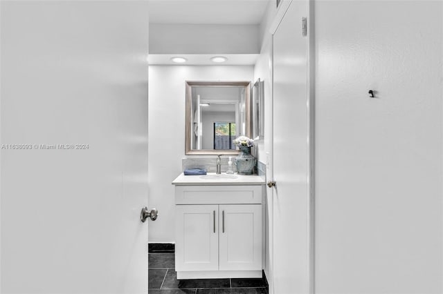 bathroom featuring vanity and tile patterned flooring