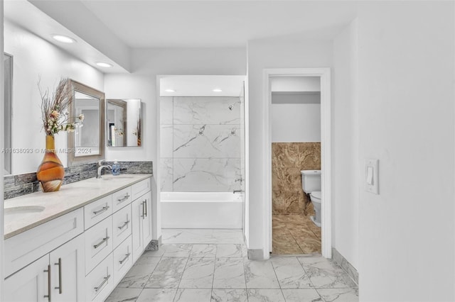 full bathroom featuring tile walls, tiled shower / bath, toilet, tile patterned floors, and dual bowl vanity