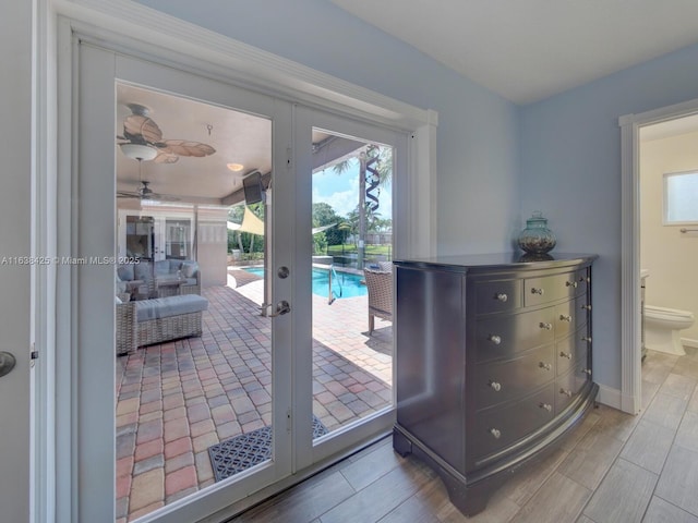 entryway featuring french doors and baseboards