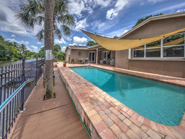 view of pool featuring a fenced in pool and a patio