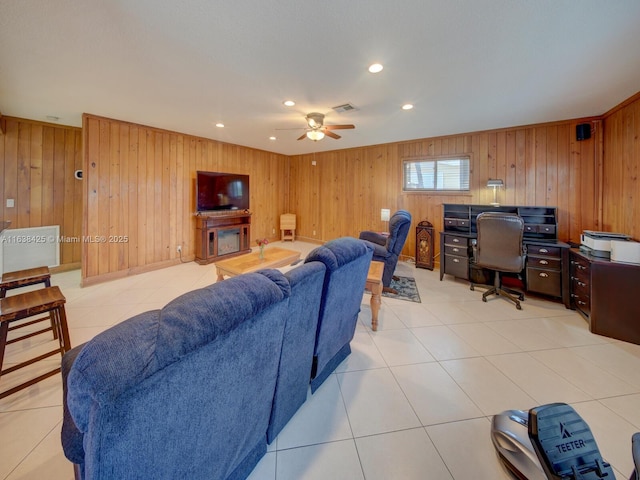 living area with light tile patterned floors, ceiling fan, visible vents, and recessed lighting