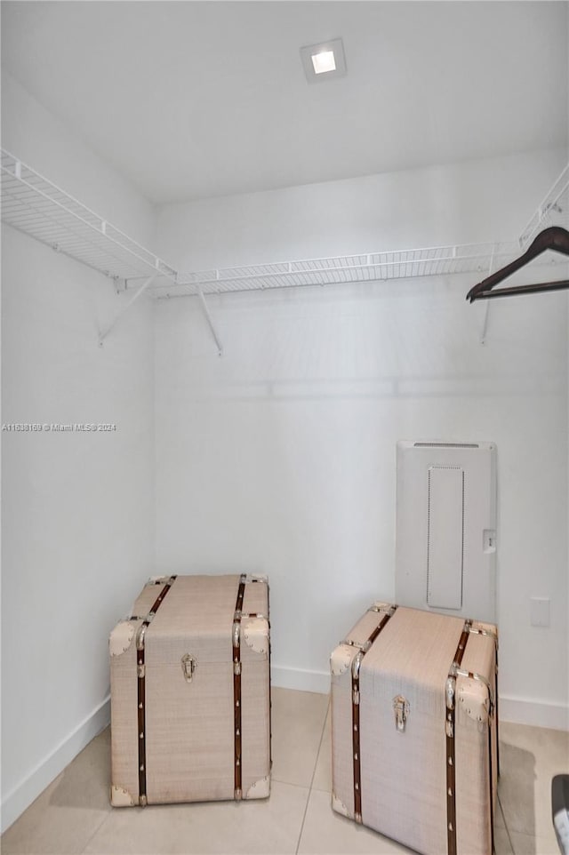 walk in closet featuring light tile patterned floors