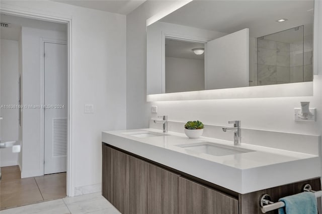 bathroom featuring double vanity and tile patterned floors