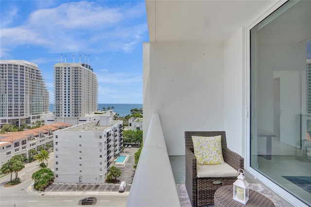 balcony featuring a water view