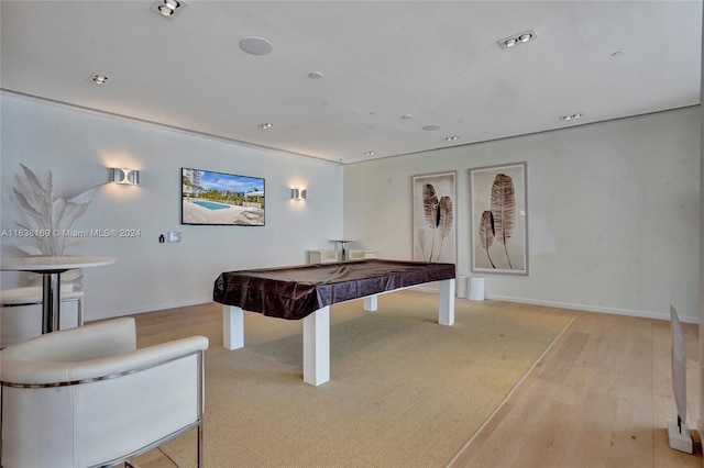 recreation room with light wood-type flooring and billiards