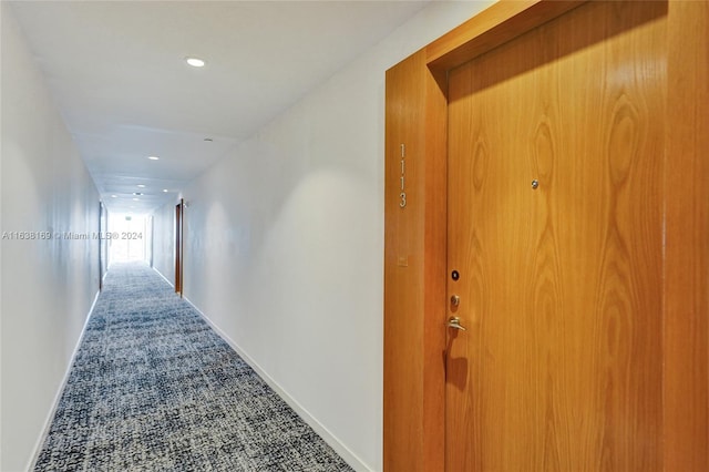 corridor featuring carpet flooring