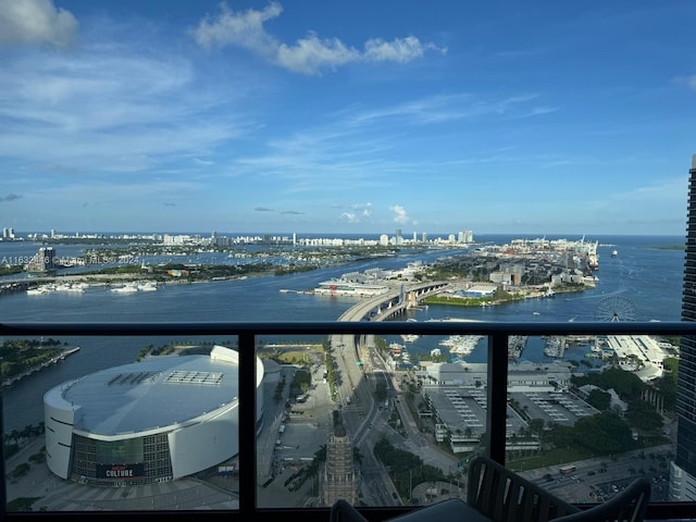 balcony featuring a water view