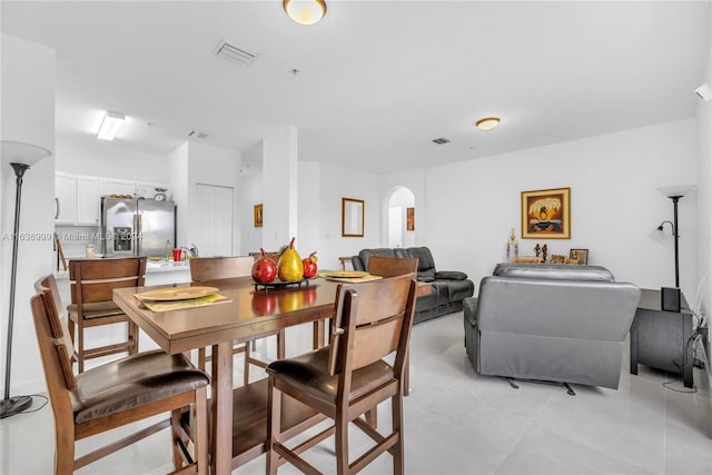 dining room featuring light tile patterned floors