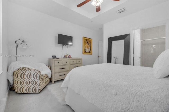 bedroom featuring light tile patterned floors and ceiling fan