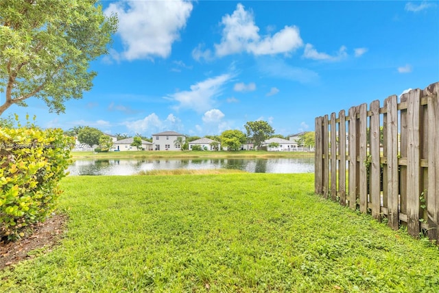 view of yard with a water view