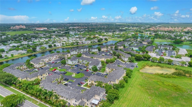 bird's eye view with a water view