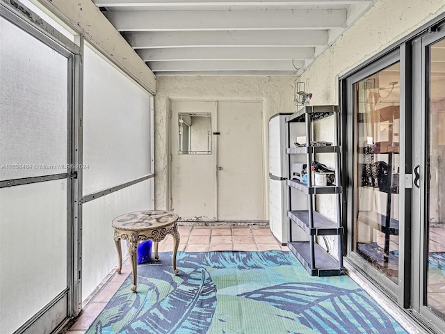 sunroom / solarium with beamed ceiling