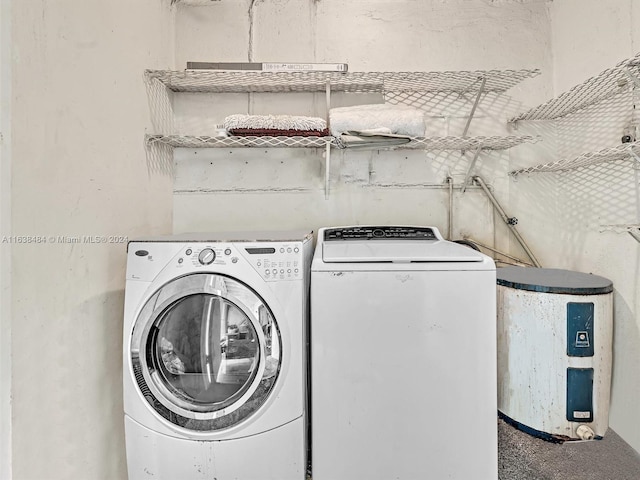 washroom featuring washing machine and dryer