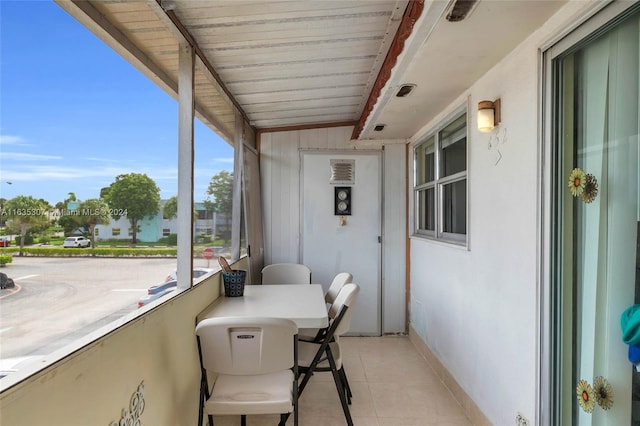 sunroom / solarium with beam ceiling