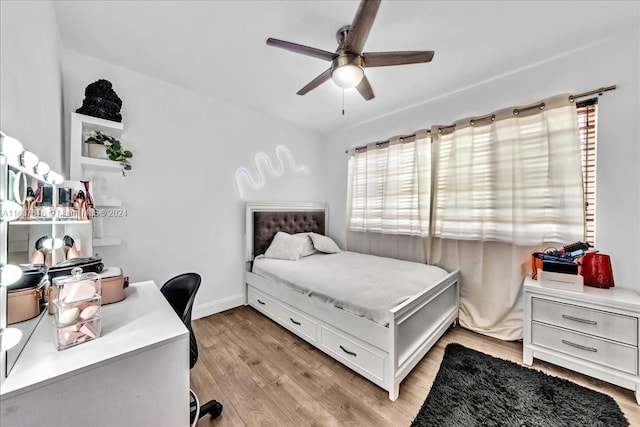 bedroom featuring ceiling fan and light hardwood / wood-style floors