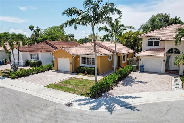 mediterranean / spanish-style house featuring a garage