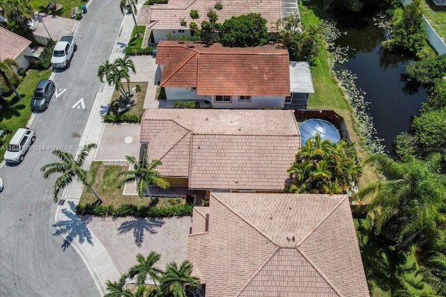 drone / aerial view with a water view