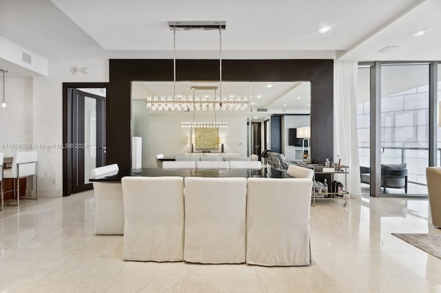 tiled living room featuring an inviting chandelier