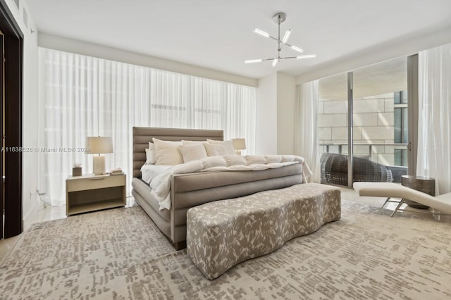 bedroom featuring a chandelier