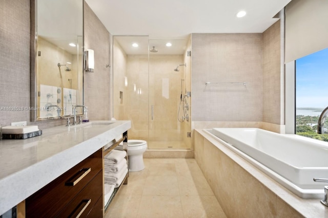 full bathroom with tile patterned flooring, vanity, toilet, and independent shower and bath