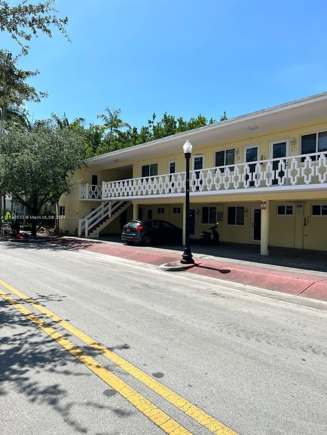 view of building exterior with a carport