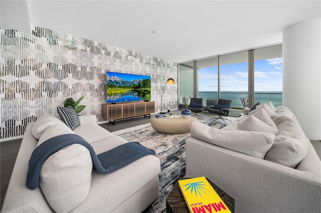 living room featuring floor to ceiling windows