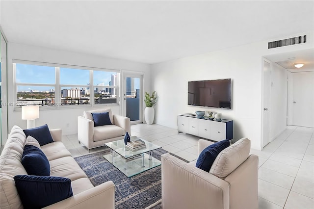 living room with light tile patterned floors