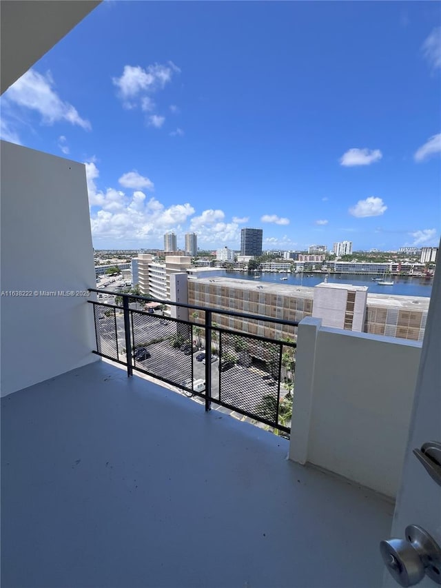 balcony featuring a water view