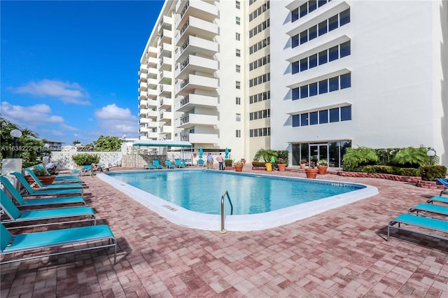 view of swimming pool featuring a patio area