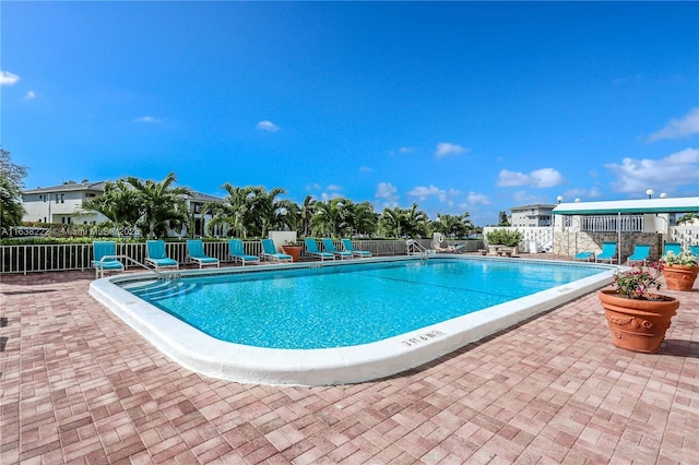 view of swimming pool featuring a patio