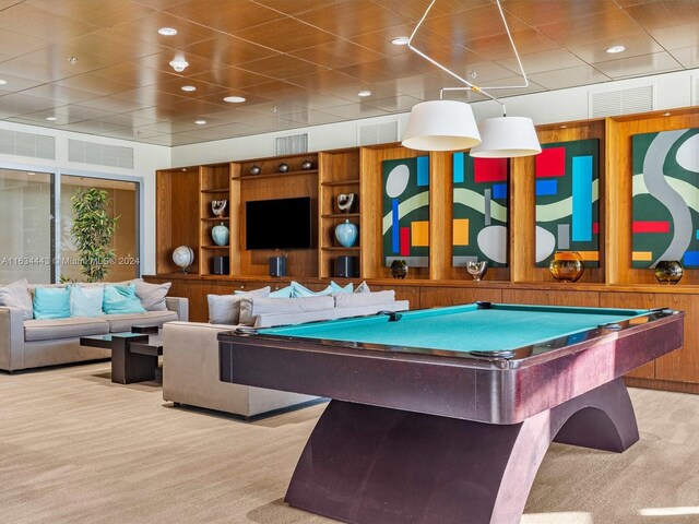 game room with pool table and light carpet