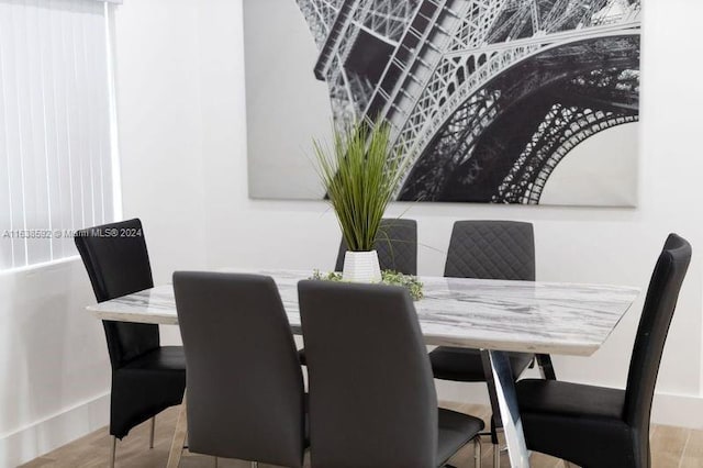 dining space featuring light hardwood / wood-style flooring