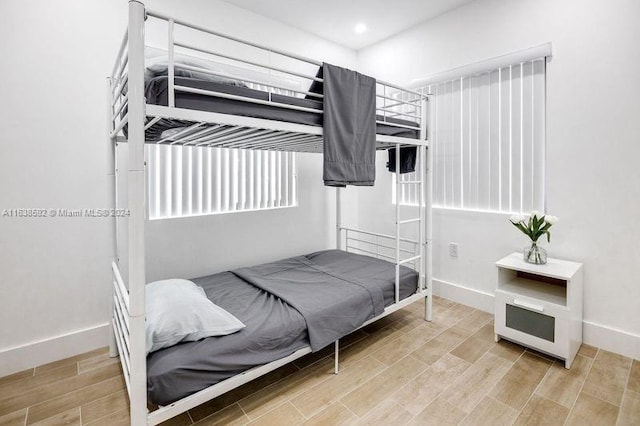 bedroom with light hardwood / wood-style flooring