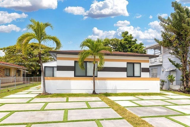 view of front facade with a patio area