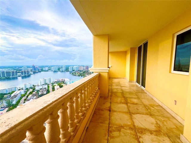 balcony featuring a water view