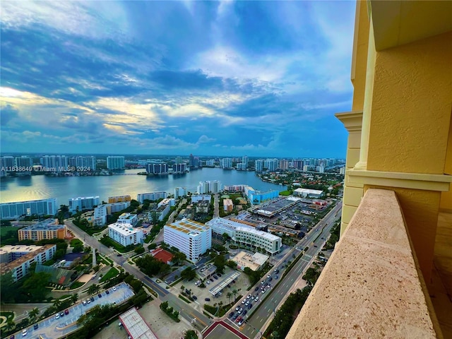 aerial view featuring a water view and a city view