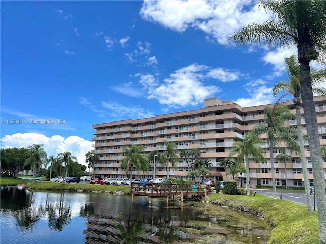 view of building exterior with a water view