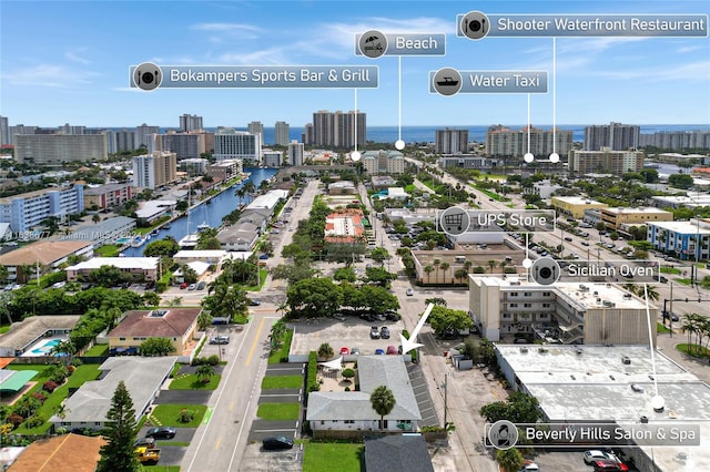 bird's eye view with a view of city and a water view