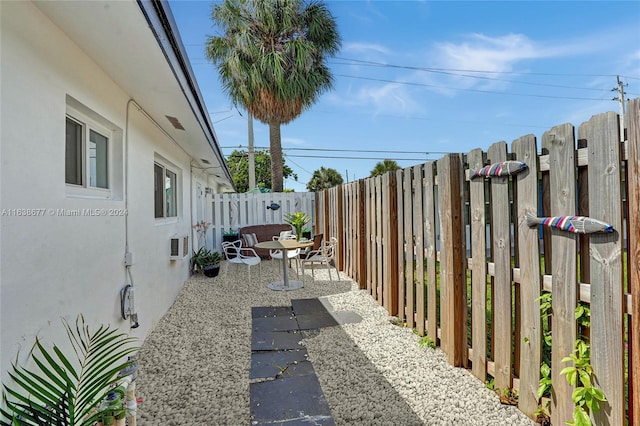 view of yard with a patio and a fenced backyard