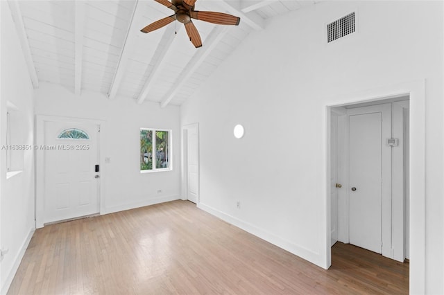 interior space with ceiling fan, wood-type flooring, high vaulted ceiling, wood ceiling, and beam ceiling