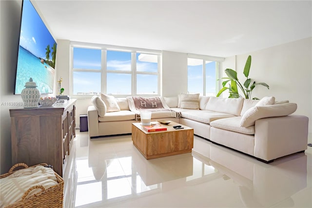 living room with light tile patterned flooring