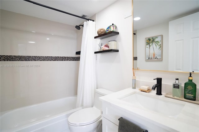 full bathroom with toilet, shower / bath combination with curtain, and vanity