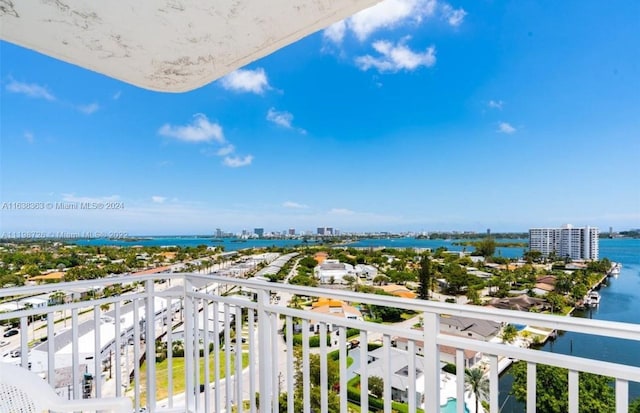 balcony featuring a water view